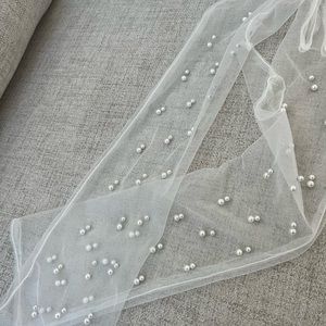 White pearl gloves